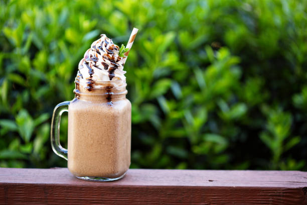 Chocolate coffee frappe for a hot summer day outside on the front porch