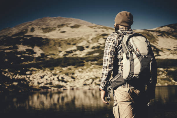 istock Hiking in the mountains alone 912766124