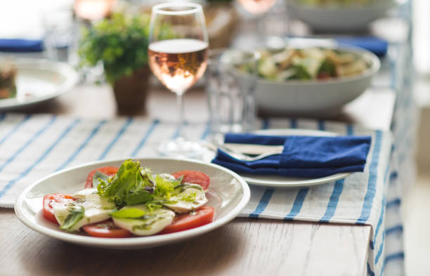 istock Restaurant table set with glasses, napkins and cutlery 912766756