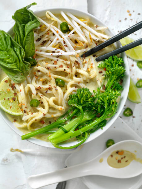 istock Green Curry Noodle Soup with Broccolini, Bean Sprouts and Fresh Basil, 912775510