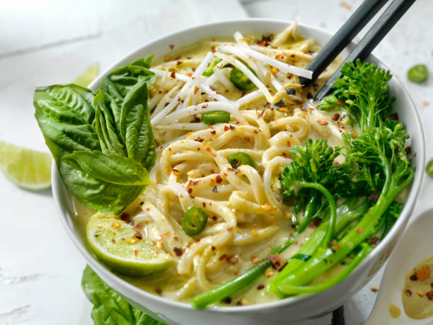 istock Green Curry Noodle Soup with Broccolini, Bean Sprouts and Fresh Basil, 912775620