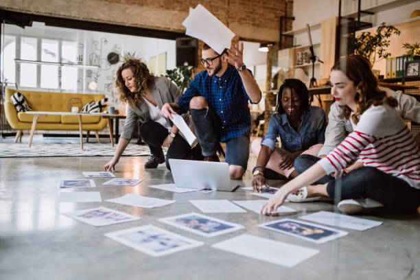 istock Imaginative Ideas And Lots Of Paperwork 912776148