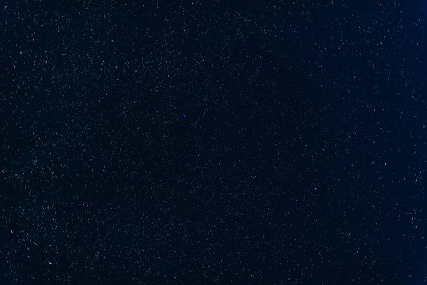 istock many colorful stars shining in night dark blue sky with nebulae 912778618
