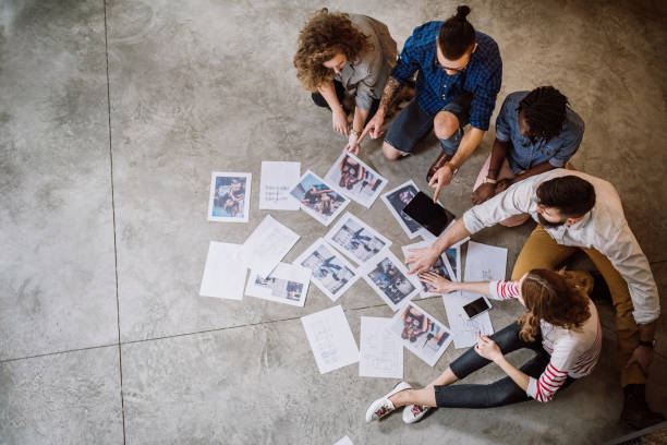 istock Imaginative Ideas And Lots Of Paperwork 912779000