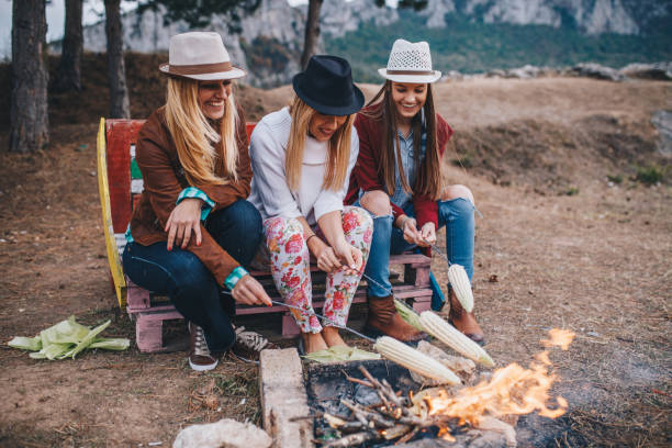 istock Happy smiling friends camping 912779034