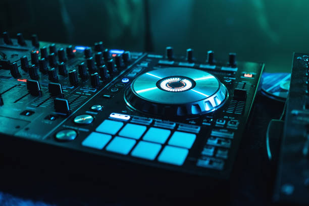 istock mixer for CDs and create a control music closeup with buttons and controllers 912779646