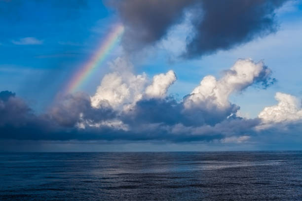 istock Early Morning Rainbow Show between Moluccas and West Papua, Indonesia 912782378