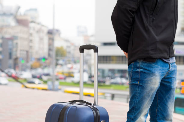 istock Traveller with baggage in the city 912789774