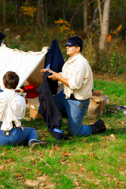 Civil War re-enactment. Coventry,RI,USA-October 28, 2017: Unknown local residents participating in a Civil War Era encampment and skirmish re-enactments. civil war enactment stock pictures, royalty-free photos & images