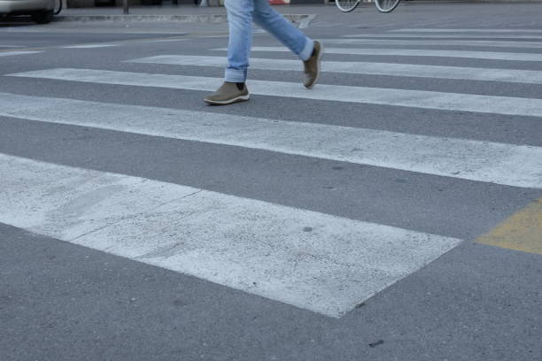 istock Isolated people crosses zebra crossing 912803346