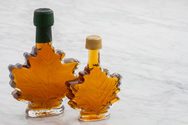 delicious maple syrup natural organic delicious maple syrup with a sweet delicate taste maple syrup stock pictures, royalty-free photos & images