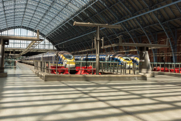 St Pancras Railway Station London, UK - Jul 21, 2017: The iconic St Pancreas Railway Station with the high spreed Eurostar trains waiting to depart late in the day. The Eurostar offers direct travel to Paris in just over two hours. Eurostar stock pictures, royalty-free photos & images