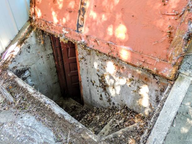 istock Scary Basement cellar of abandoned building light streaming 912826522