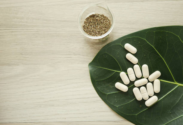 istock alternative herb medicine. herbal vitamin on white background. 912826736