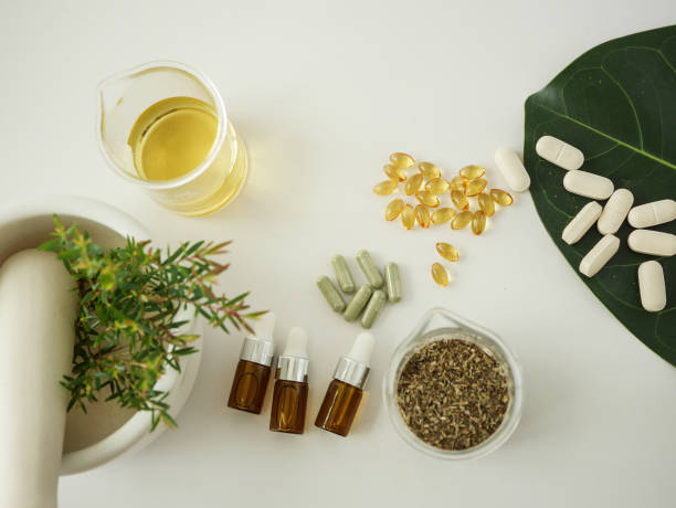 istock alternative herb medicine. herbal vitamin on white background. 912826816