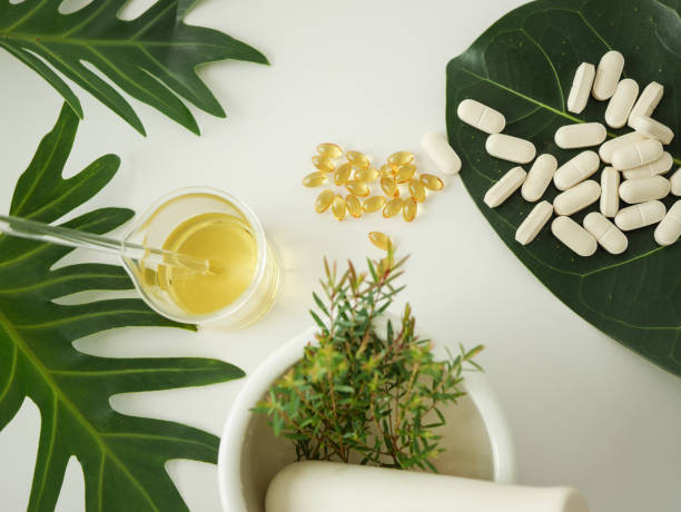istock alternative herb medicine. herbal vitamin on white background. 912826828