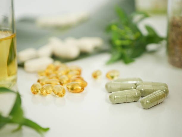 alternative herb medicine. herbal vitamin on white background.
