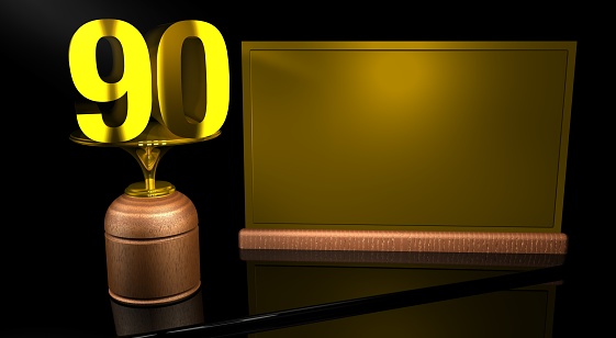 Rendering 3D Wooden trophy with number 90 in gold and golden plate with space to write on mirror table in black background. Commemorative Trophy number 90 for celebrating anniversaries or important dates