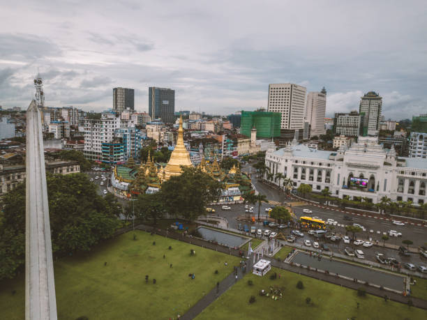 Aerial point of view of Sule Pagoda in Yangon city, Myanmar Aerial point of view of Sule Pagoda in Yangon city, Myanmar 
Drone shot, overcast day.
Travel city concept sule pagoda stock pictures, royalty-free photos & images