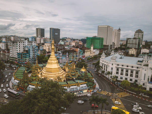 Aerial point of view of Sule Pagoda in Yangon city, Myanmar Aerial point of view of Sule Pagoda in Yangon city, Myanmar 
Drone shot, overcast day.
Travel city concept sule pagoda stock pictures, royalty-free photos & images
