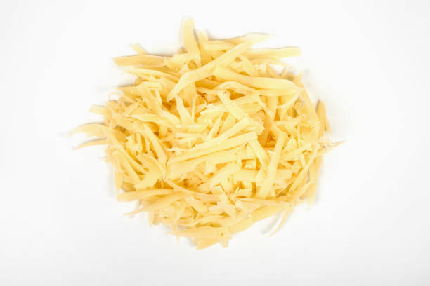 istock Heap of grated cheese, isolated on white background. 912841858