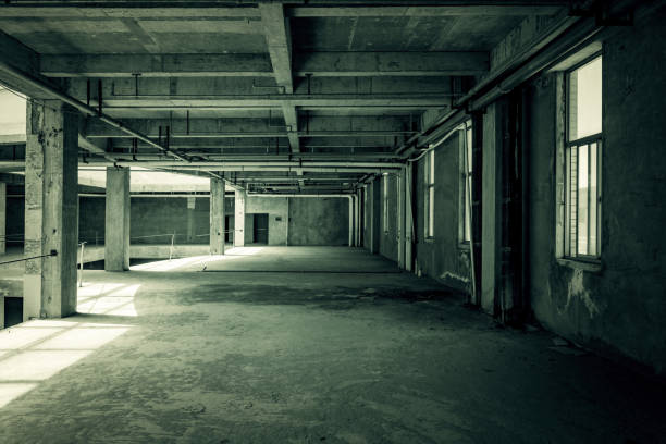 istock corner of old concrete room with blue sky window 912844930