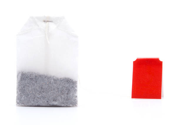 istock Classic teabag with red label isolated on white background 912845158