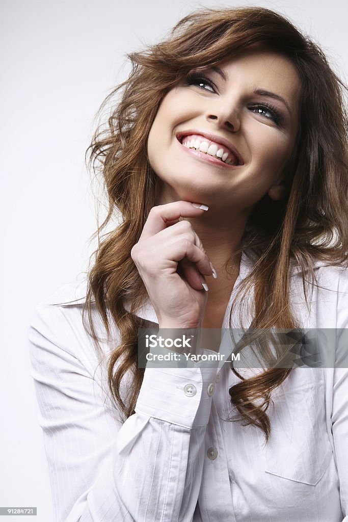 Smiling brunette.  Adult Stock Photo