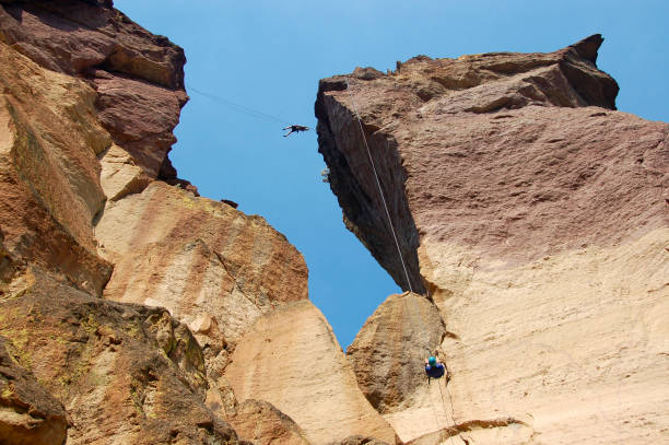 istock Climber and Rappeller on Monkey's Face, Smith Rock State Park, OR 912849642