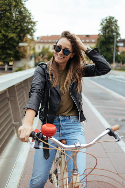istock Girl on a bike 912852688