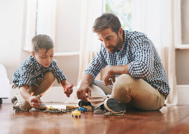 istock Dad makes time for play in his busy day 912863218