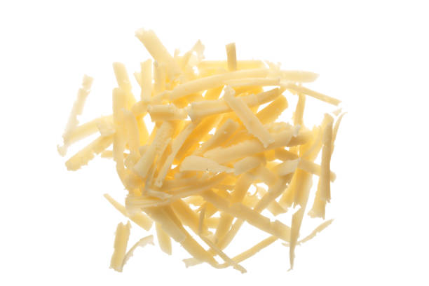 istock grated cheese isolated on white background. Top view 912863248