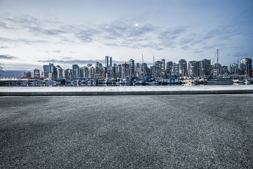vancouver city skyline and harbor with asphalt road,Canada.