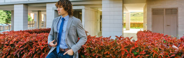 istock Businessman posing in the street 912871032
