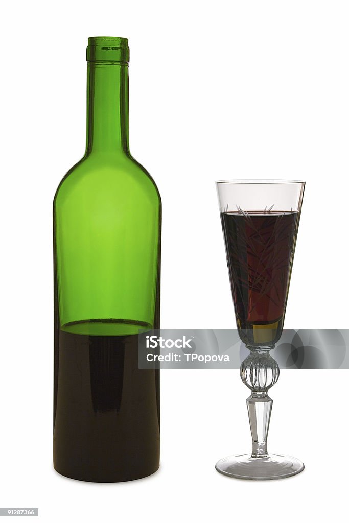 Glas mit Rotwein und eine Flasche - Lizenzfrei Alkoholisches Getränk Stock-Foto