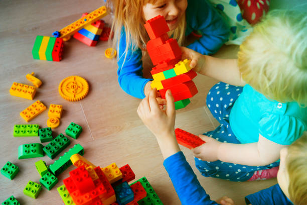 istock kids play build with plastic blocks indoors 912875662