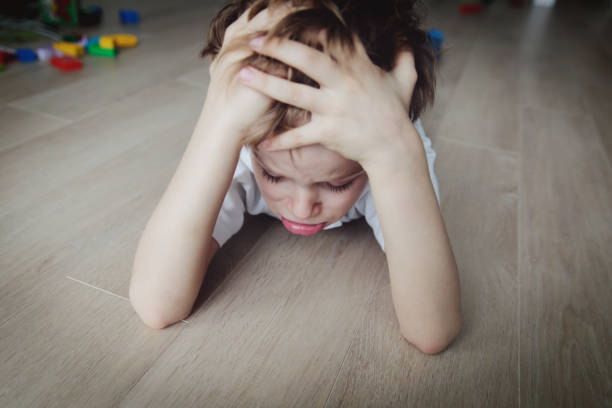 istock sad child, stress and depression 912875828