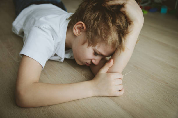 istock sad child, stress and depression 912875860