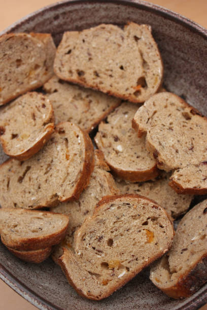 istock Sliced bread  Cereals and candied fruit bread 912878482