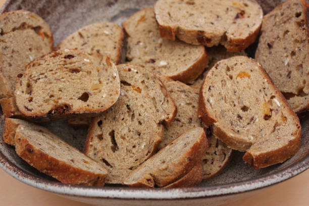 istock Sliced bread  Cereals and candied fruit bread 912878484