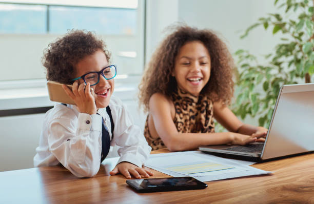 Cute boy and a girl working together as a team