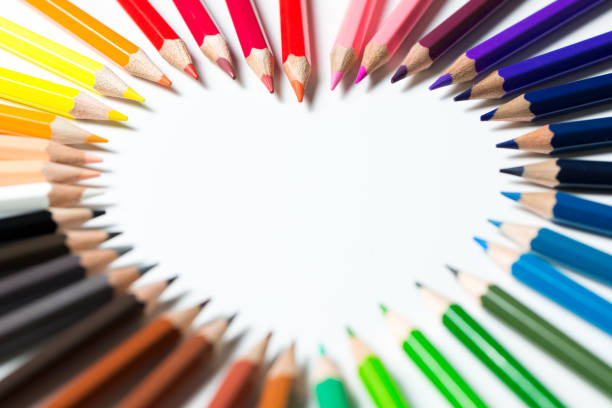 istock Color pencils arranged in a heart shape 912890112