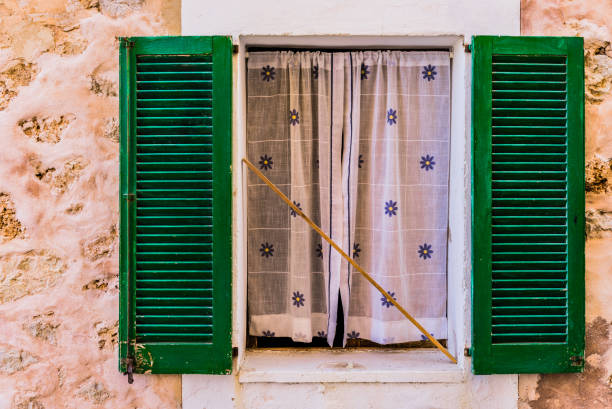 istock Open window shutters of mediterranean house 912890664