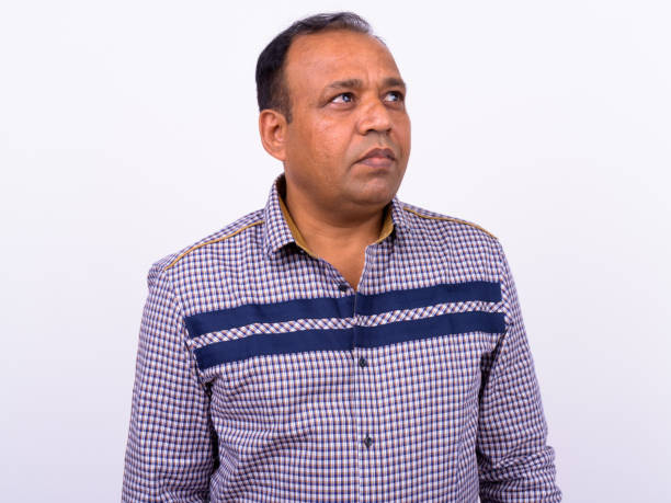 Portrait Of Indian Man Against White Background