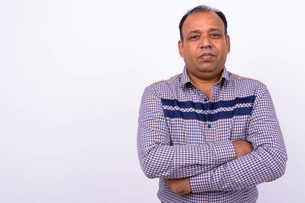 istock Portrait Of Indian Man Against White Background 912894524
