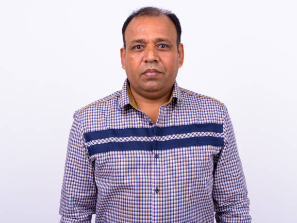 istock Portrait Of Indian Man Against White Background 912894536