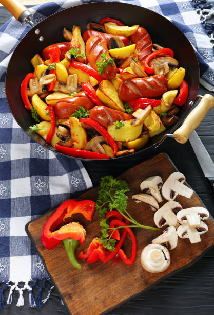 istock hot delicious grilled sausages with vegetables 912894724