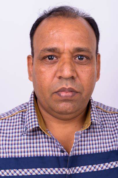 istock Face Of Indian Man Against White Background 912896880