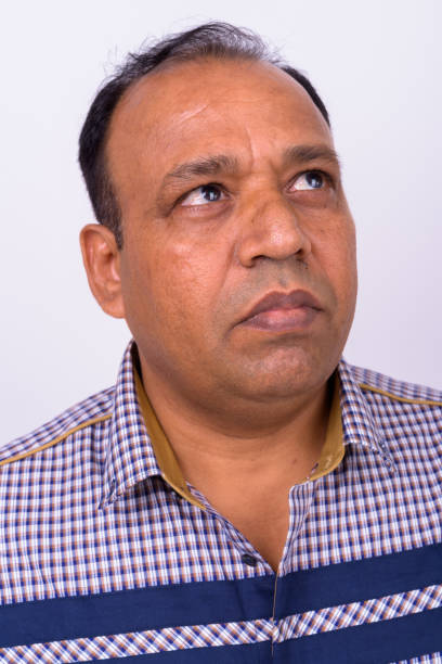 istock Face Of Indian Man Against White Background 912896958