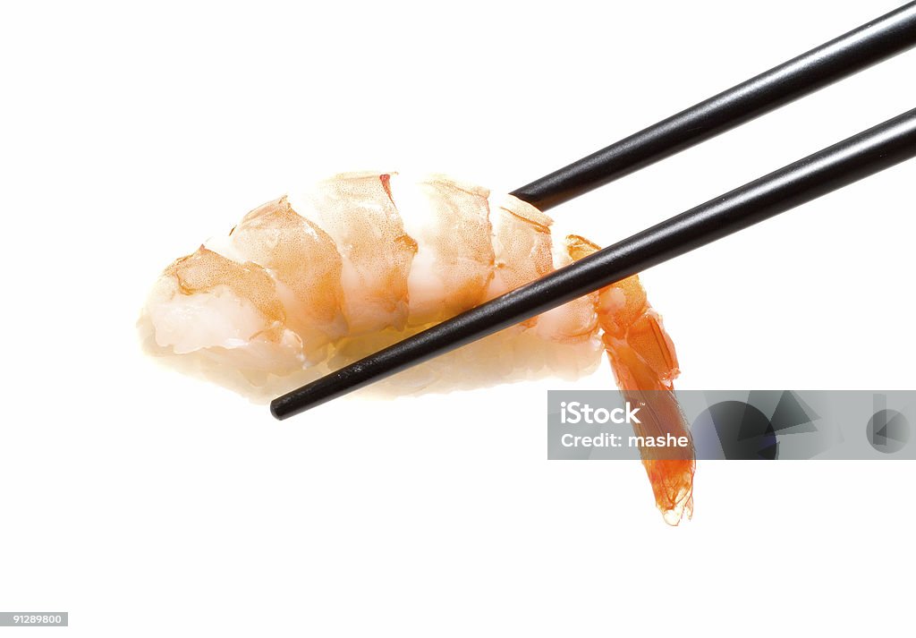 Sushi i pałeczki strzał na białym - Zbiór zdjęć royalty-free (Bez ludzi)